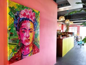 Chido showcases local artists' works, including "Frida Kahlo" by Geovanni Abing.  at Chido Cafe in Tagbilaran