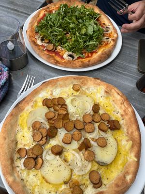 Pizza rucola and paisana at La Carretta in Hotton