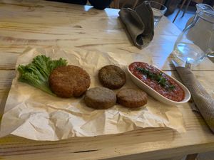 Cutlets platter with sauce  at VegaRoom in Lviv