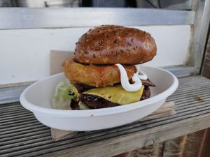 Burger with onion ring at Roots in Aberdeen
