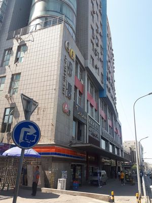 This is the hotel. Entrance gate on left side of hotel at Yuanqi Vegetarian - 缘启妙膳 in Urumqi