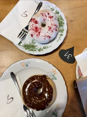 Chocolate sprinkle doughnut and special of the day doughnut.  at Sprössling in Zurich