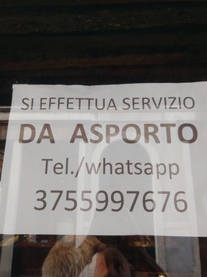 Sign on the window at Gibran, July 2021 at Gibran in Venice