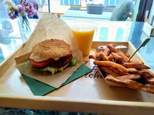 Spicy Bean Burger, Sweet Potato Fries and Mango Lassi at Oaza Joyful Kitchen in Zagreb