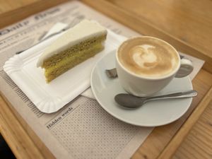 Daily lemon pie with cappuccino  at Oaza Joyful Kitchen in Zagreb