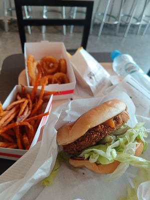 Crispy Supreme Buffalo Burger, onion rings and sweet potato fries at MAX - Jana Pawła in Warsaw