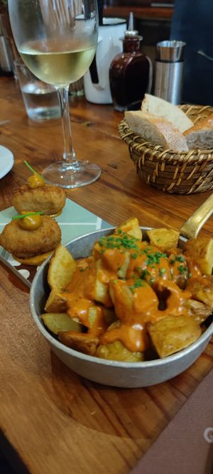Patatas bravas and vegan "chicken". at Sensi Gourmet Tapas in Barcelona