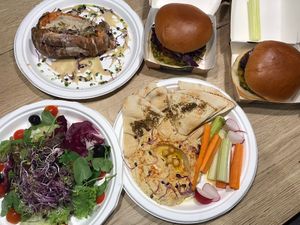 Burger, salad, stuffed sweet potatoe and Hummus for take away at Can Nuts in Ibiza