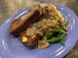 
Lentil mushroom “meatloaf” with mushroom gravy, garlic mashed potatoes and green beans. at The Root Cellar in Pittsboro