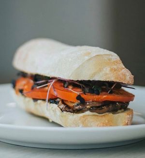 Eggplant sandwich! Local marinated and roasted eggplant with tomato, micro greens and a house hummus. Served on ciabatta or as a salad.  at Jonny Bean Coffee in Lethbridge
