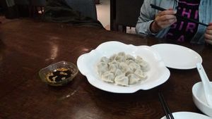 Mushroom filled jiaozi (dumplings) and sesame vinegar dipping sauce. at TiānLóng Bǎo Yán in Xian