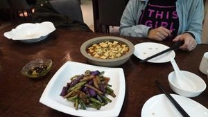 Braised aubergine with greens and home style tofu. at TiānLóng Bǎo Yán in Xian