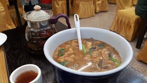 This dish looked better than it tasted. The fried breaded soy protein was a gooey mush in the gravy. at Daxingshan Temple Vegetarian in Xian