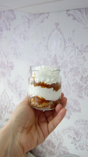 Banoffee: Crumble gluten free, caramelized banana, coconut toffee, vegan cream. at El Desig Pastissers  in Canet De Mar