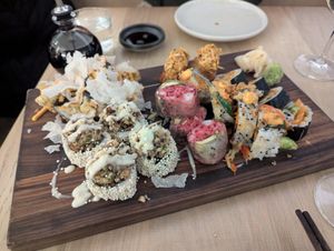 Sushi in lower left corner was coated in teeny tiny crisp rice balls - great flavor and texture! at Bloom Sushi in Montreal