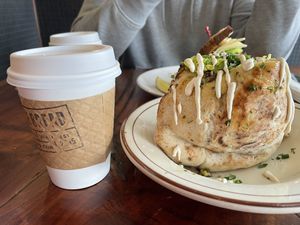 Coffee for scale on how large this pita sandwich is! at Lodge Bread in Los Angeles