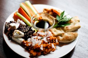 Oven baked beets, tomatobulgur, spicy hummus. at Sub Scene in Oslo