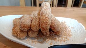 Pumpkin rolls at Duǒ Duǒ Kāi 朵朵开素食 - Houzaimen in Jinan