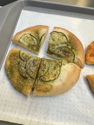 Mini pizza with courgette and pistacchio  at stritFUD in Taormina
