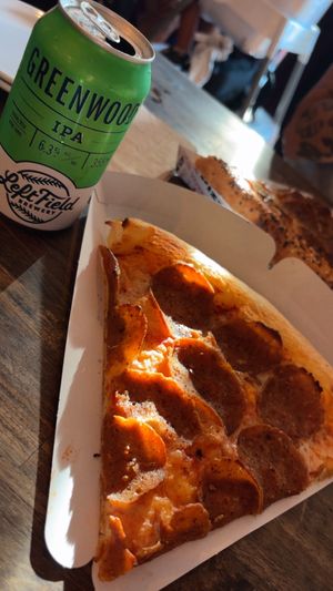   at Rise Above Pizza & Wings in Hamilton