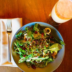 Lacinato Kale Quinoa Salad w/ roasted kabocha squash, apple, dcranberry, pumpkin seeds, fennel, apple cider vinaigrette; Nellie Melba Smoothie with peach, coconut milk, banana at Murray Circle in Sausalito