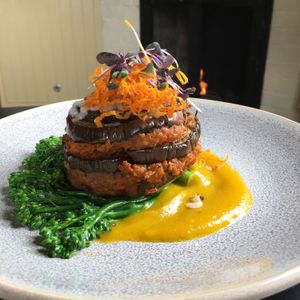 Beyond Moussaka, beyond meat, eggplant tort, broccolini, currants, vegan mozzarella, Garamond masala, kabocha purée  at Murray Circle in Sausalito