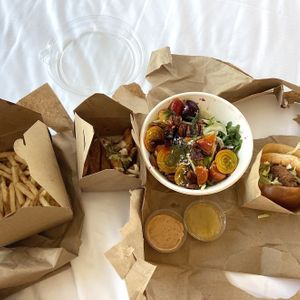 Fries, yam fries, beet & apple salad, and chick-un sandwich at BeetBox in Vancouver