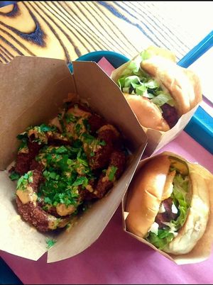 Beetbox Chickun Burgers and Onion Rings at BeetBox in Vancouver