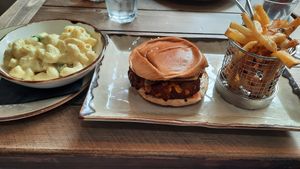 Corn burger with fries and a side of vegan mac & cheese at Fancy Hank's in York