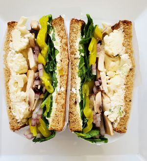 Cauli Sandwich}
{Cauliflower, Mushroom, Onion, Spinach, Banana Pepper, Scallion Tofu cream cheese. Served on sliced 7-grain bread. at Bagel Point in Brooklyn
