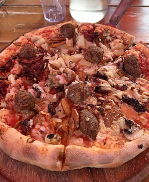 My vegan pizza with vegan meatballs & pepperoni, vegan cheese, mushrooms, sun dried tomatoes, & mushrooms. at The Secret Stash in Crested Butte