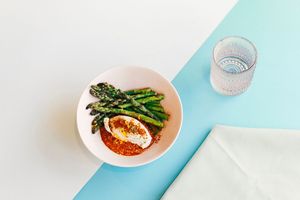 grilled asparagus and harissa at Somebody People in Denver