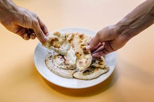 hummus with aleppo pepper and chili oil at Somebody People in Denver