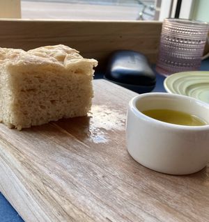 Complimentary focaccia and OO  at Somebody People in Denver