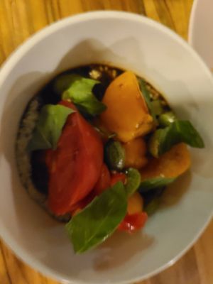 Airloom tomatoes with a basil pesto at Somebody People in Denver