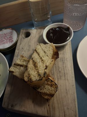 Bread with a sesame spread   at Somebody People in Denver