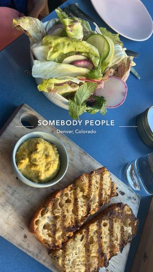 Feed me course #1, usually amazing grilled focaccia bread and salad. This one has a rutabaga spread and a chicory salad with “fish sauce” vinaigrette   at Somebody People in Denver