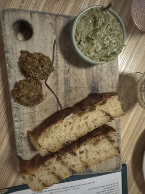 Focaccia and artichoke spinach dip with stuffed mushrooms   at Somebody People in Denver