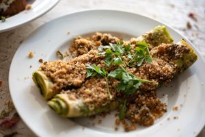 
The Rotolini is pasta filled with a purred mushroom Bolognese with almond ricotta, spinach, and garlic bread crumbs. at Somebody People in Denver