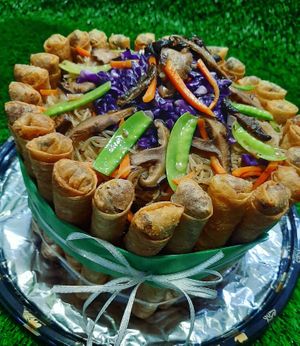 Pinoy Style Cake 
Festive Savory Cake of Lumpiang Shanghai Rolls and your choice of Sweet Style Spaghetti or Pancit Guisado
Available in 6" or 8" at Veggie Guys in Quezon City
