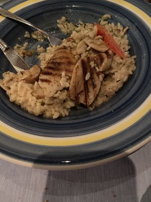 Mushroom risotto (halfway eaten lol). So good! at Hauser in St Moritz