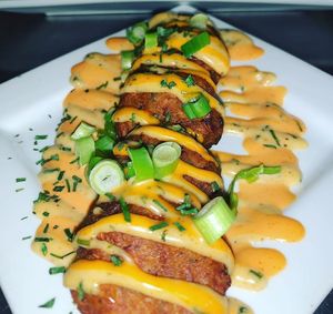 "Major Figgas"- Our mini krab cakes made with jackfruit & hearts of palm, drizzled with 2 house made sauces at Go Vegan Philly in Wilmington