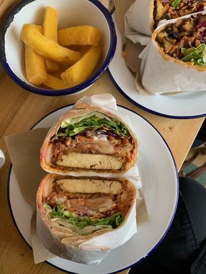 Tempeh tikka masala flatbread and polenta fries  at Okra in Shrewsbury