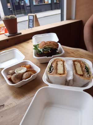 Classic burger, jacket potato fries and Korean tofu flatbread at Okra in Shrewsbury