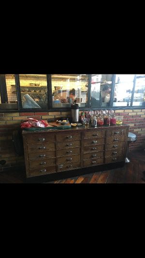 Bread bar that come with your food. A big hunk of bread to self cut and lots of pickled vegetables    at Saemundur i Sparifötunum in Reykjavik