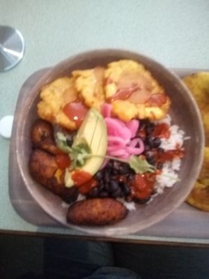 Vegan bowl ! Ps. Ordered additional tostones with avocado 🤩 to die for ! at Mayo Ketchup in St Louis
