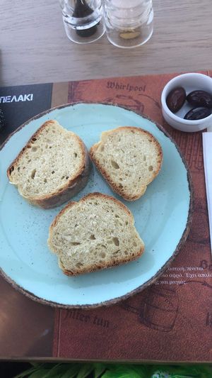 Warm bread with black olives   at Ampelaki in Kefalonia
