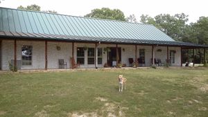 Here is our home.  You can stay in our lake view bedroom or our "Texas" bedroom.   at Nickeys' Nest in Paris