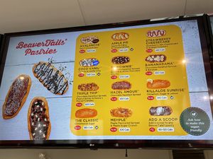 The menu board with the vegan beavertails labeled.  at BeaverTails in Niagara Falls