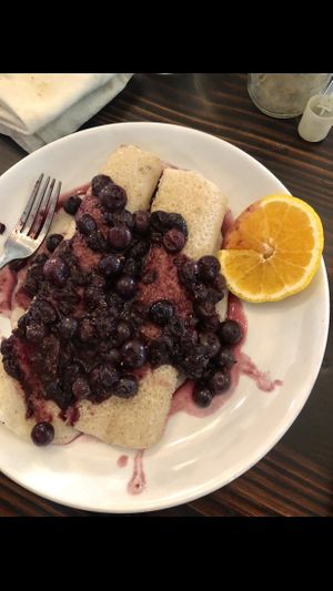 Blueberry compote crepes filled with almond ricotta. Was the special of the day. So good! at Giving Tree Cafe in Phoenix